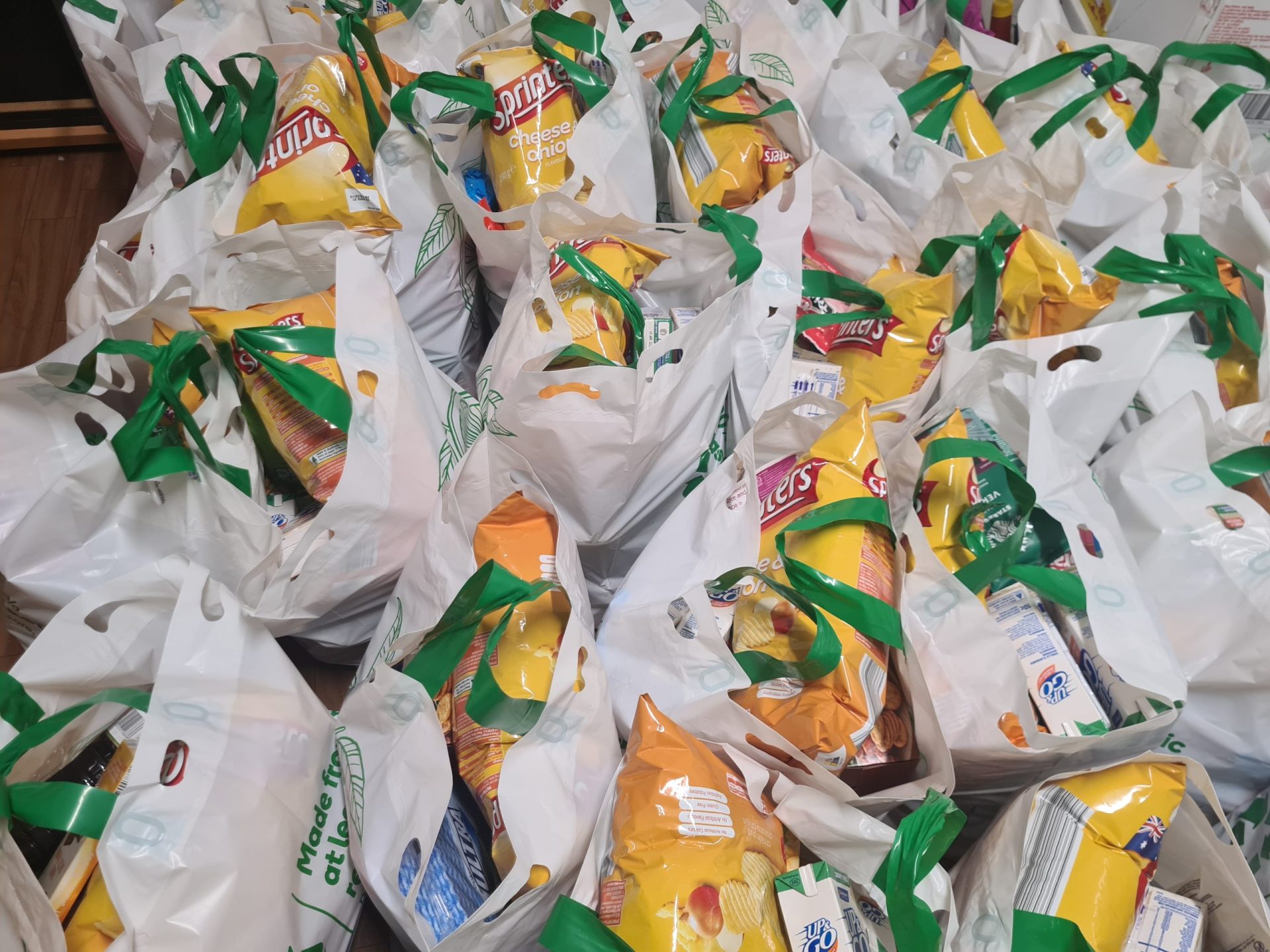 grocery bags filled with food products